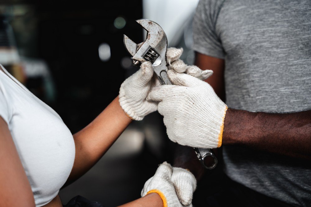 close-up-mechanic-hand-with-his-tool-holding-a-spa-2026-01-08-23-48-24-utc